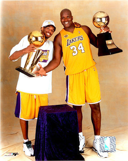 Kobe Bryant and Shaquille ONeal with 2000 Championship Trophies Photo