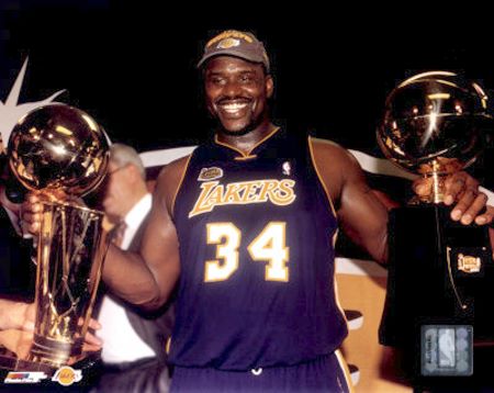 Shaquille ONeal - With 2001 Trophies Photo