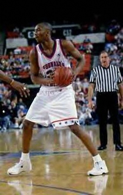 Picture 4 of Kobe Bryant with his Lower Marion High School basketball uniform