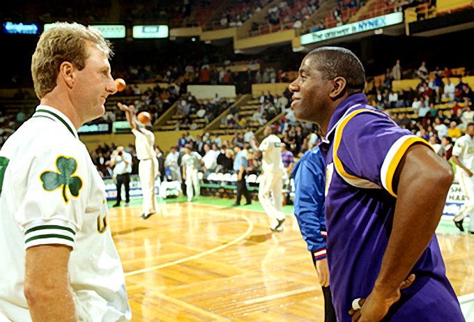 Picture of Los Angeles Lakers Magic Johnson and Boston Celtics Larry Bird talking before a regular season game in 1991. Photo by Steve Lipofsky