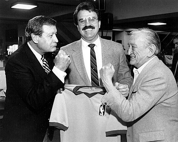 Picture of Two symbols of the rivalry, Lakers announcer Chick Hearn and Celtics announcer Johnny Most. Photo by Steve Lipofsky
