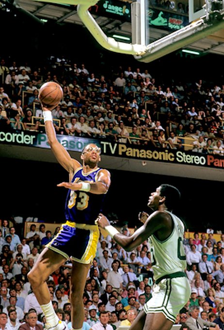 Picture of Los Angeles Lakers Kareem Abdul-Jabbar and his Sky Hook over Boston Celtics Robert Parish. Photo by Steve Lipofsky