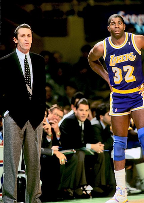 Picture of Los Angeles Lakers coach Pat Riley talking with Magic Johnson in a game at the Boston Garden. Photo by Steve Lipofsky