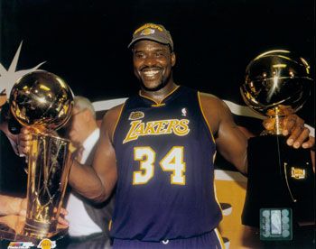 Lakers 2001 Championship: Shaquille O'Neal with 2001 NBA Championship trophy and FInals MVP trophy