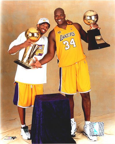 Kobe Bryant and Shaquille ONeal with 2000 Championship Trophies Photo