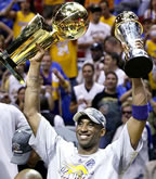 Lakers Kobe Bryant holding the NBA Trophy and the Finals MVP after defeating the Orlando Magic 4-1 in the NBA Finals